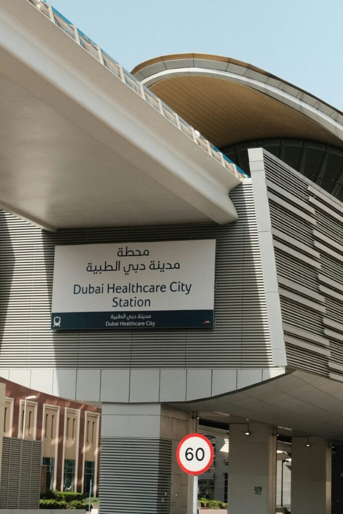 Dubai healthcare city station sign on modern building